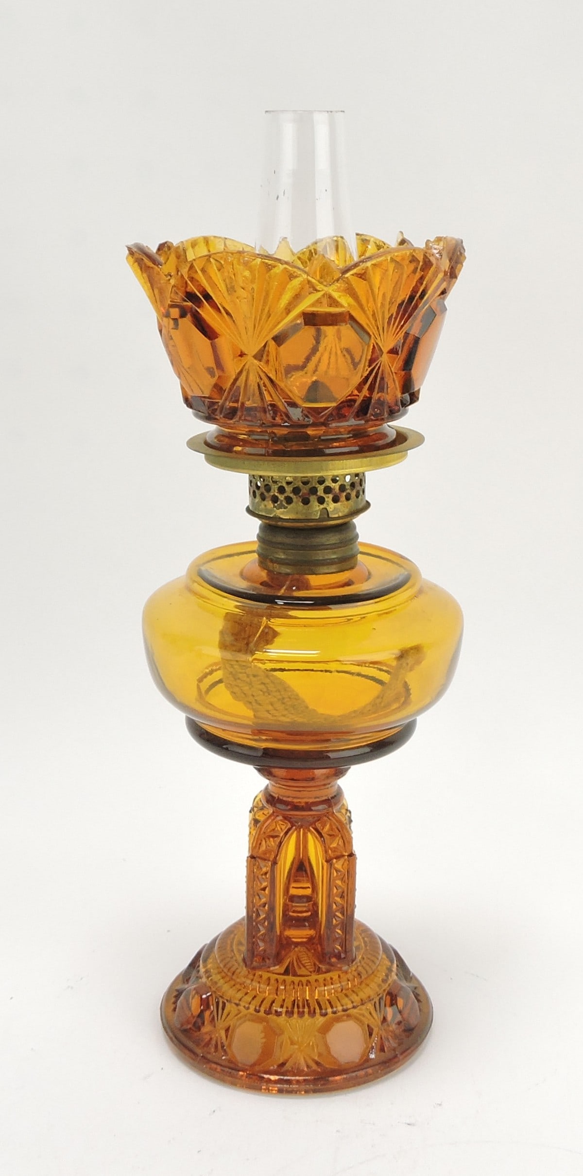Amber glass 'Cathedral' miniature: oil lamp, 8 3/4" Smith p199 fig 480