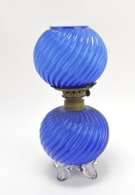 Blue cased glass swirl embossed