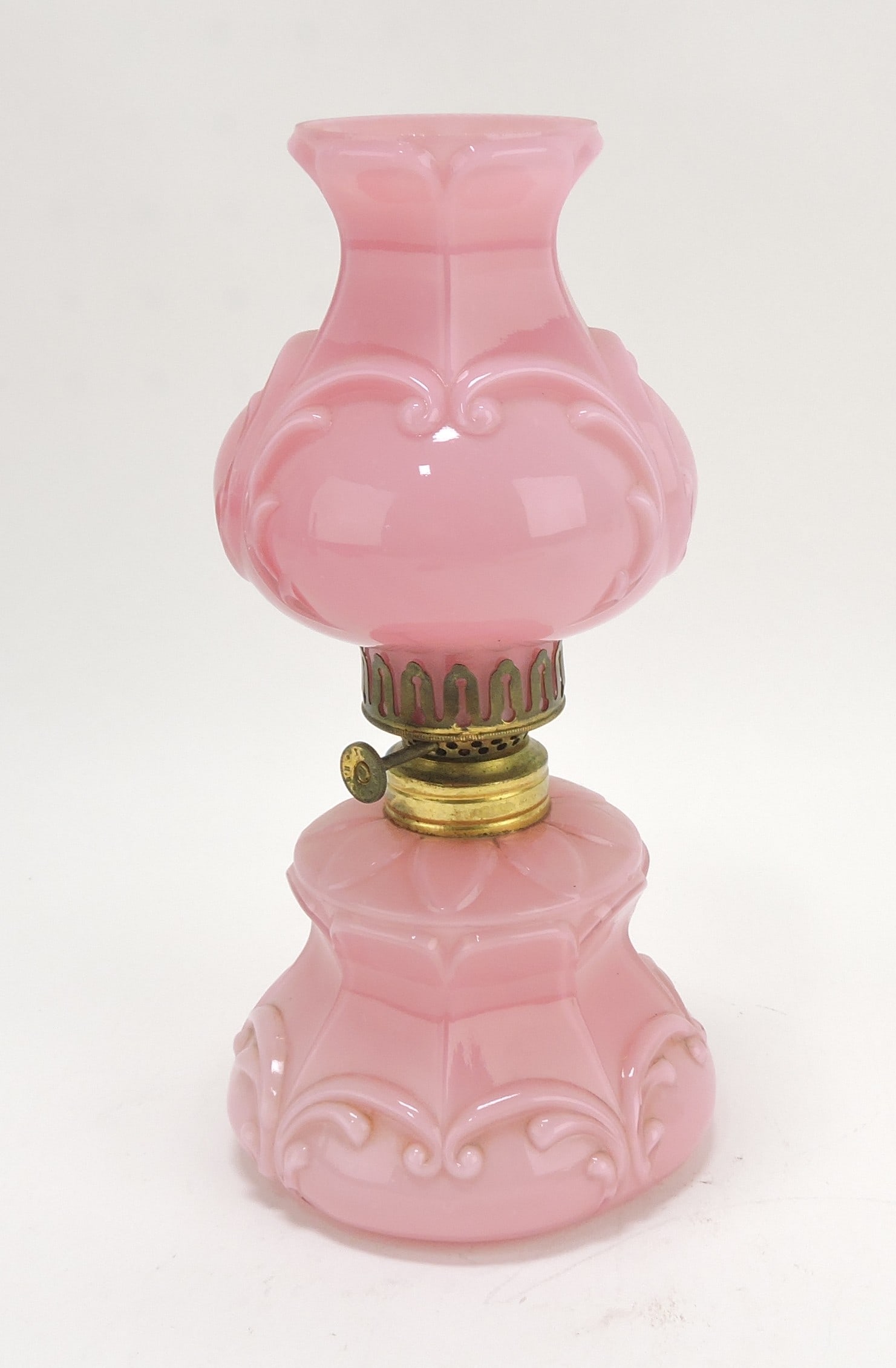 Pink cased glass miniature oil lamp,: 8 1/2"