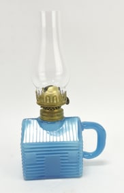 Blue opaline Atterbury log cabin