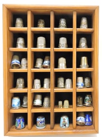 Lot of 34 thimbles including many