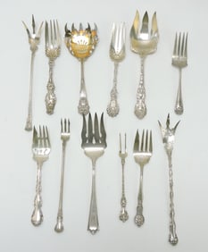 Sterling silver lot of 12 serving forks,