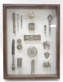 Frame of sterling silver assorted items,