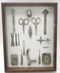 Frame of sterling silver match safes and