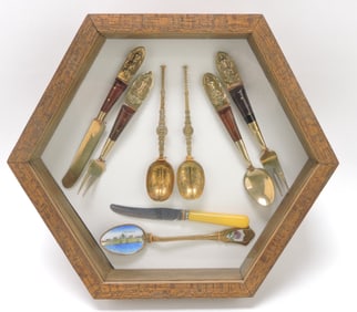 Frame of spoons, forks, and knives,