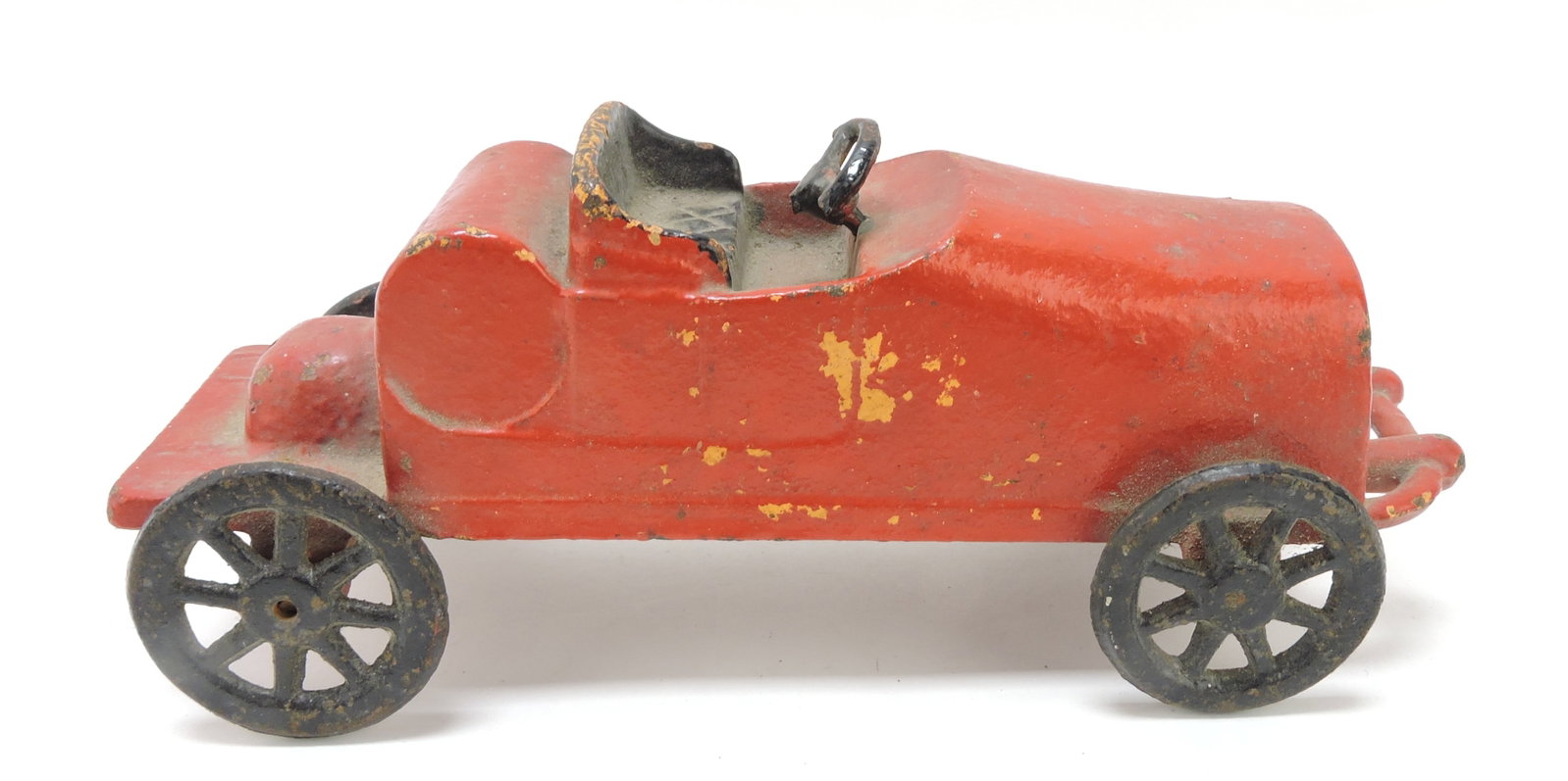 Cast iron car 8 1/2"x3 1/2", maker: unknown, broken steering wheel