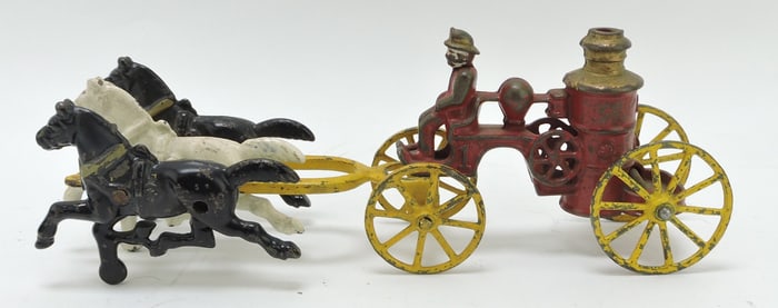 Cast iron horse drawn fire engine,