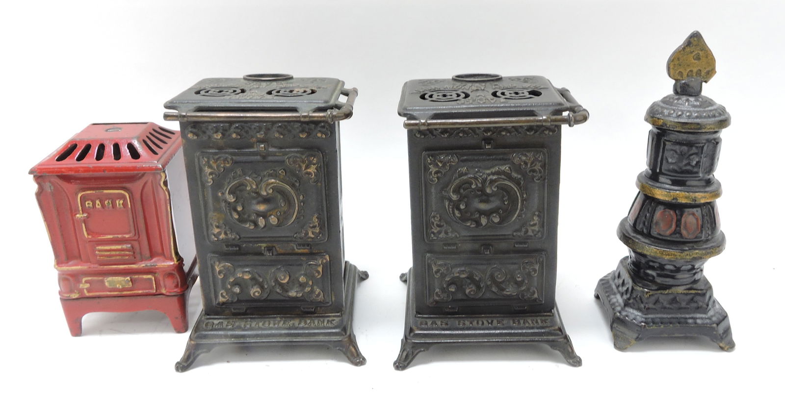 Lot of 4 'stove' still banks, 4 1/2" to (1 of 1)
