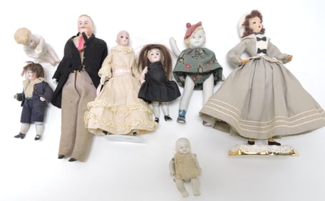 Lot of bisque, porcelain, and other dolls,