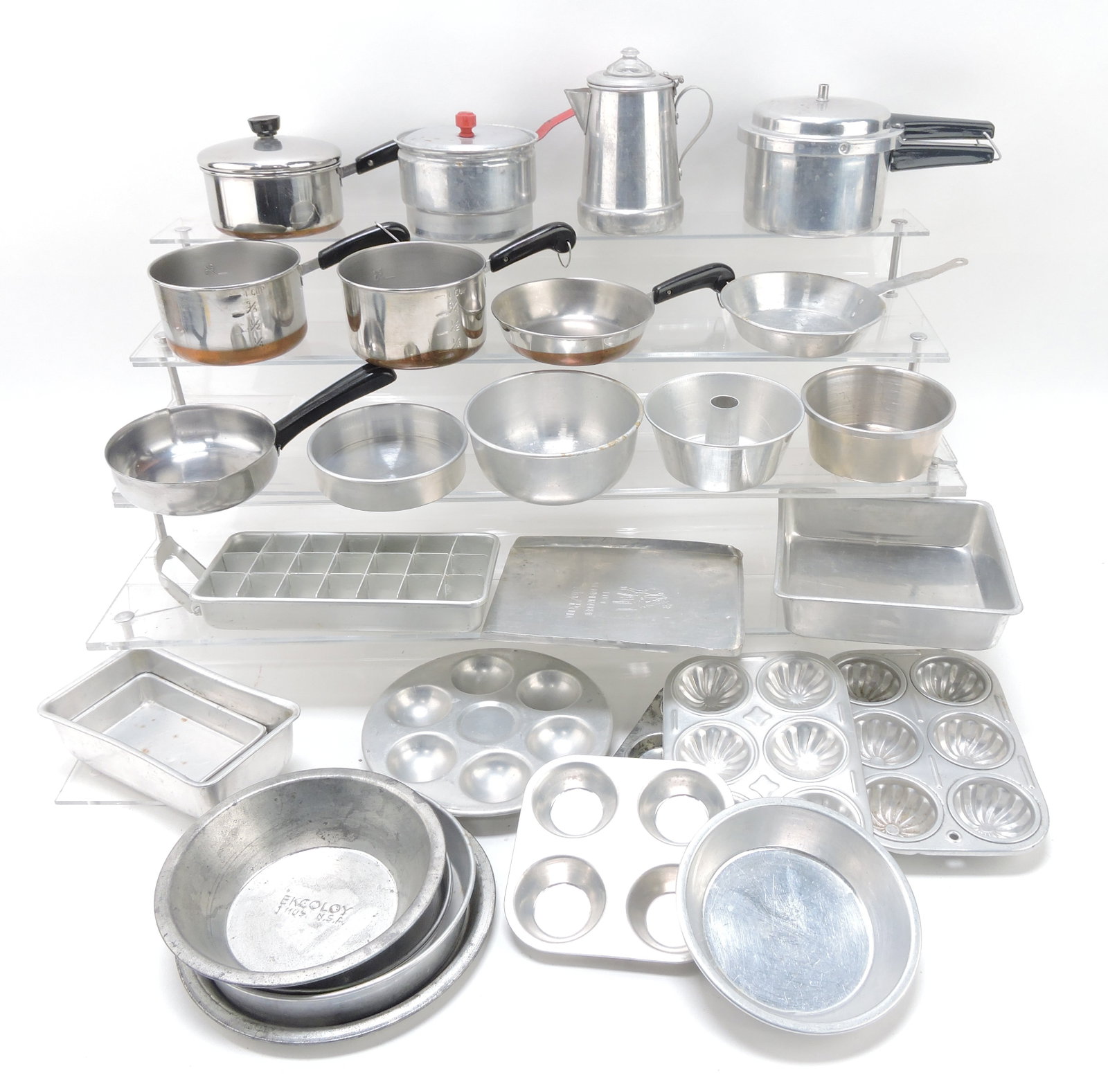 Lot of assorted child's tin cookware: .