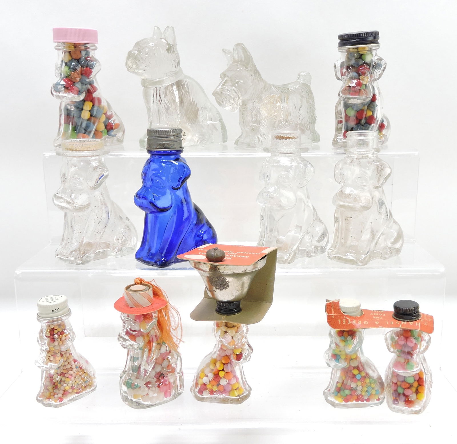 Lot of 13 dog glass candy containers, (1 of 1)