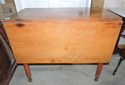 Primitive cherry drop leaf table,