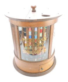 Merrick's curved glass revolving spool
