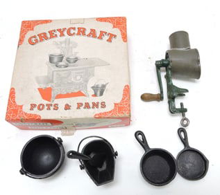 Greycraft set of child's cast iron pans