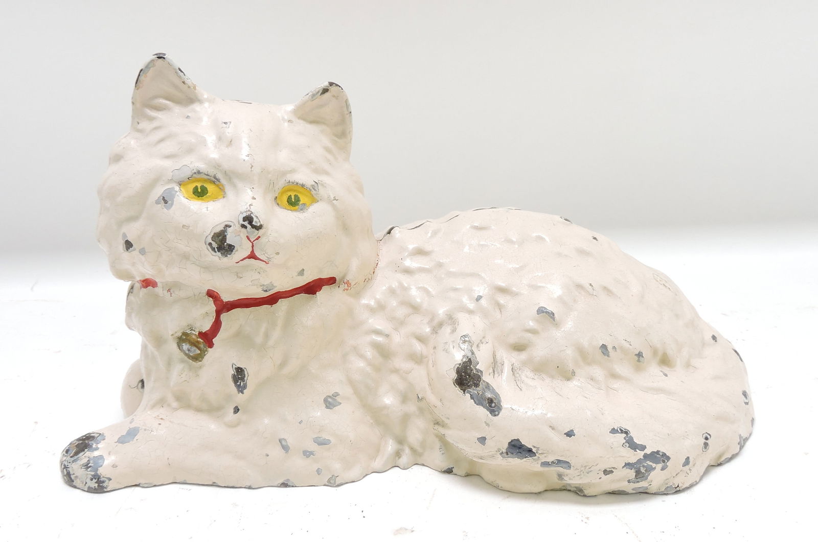 Cast iron Hubley cat door stop,: 6"h, 11"l, some paint loss