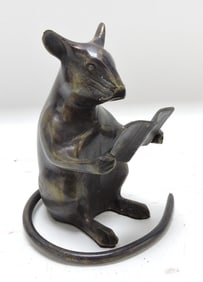 Bronze mouse reading a book, 4 1/2"