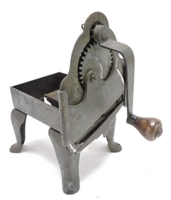 Meta antique tobacco grinder,
