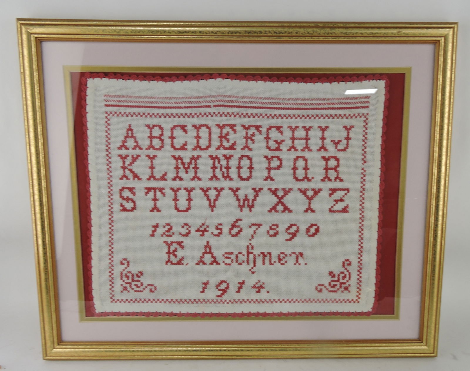 Framed sampler, E. Aschner, 1914,: 18"x22"