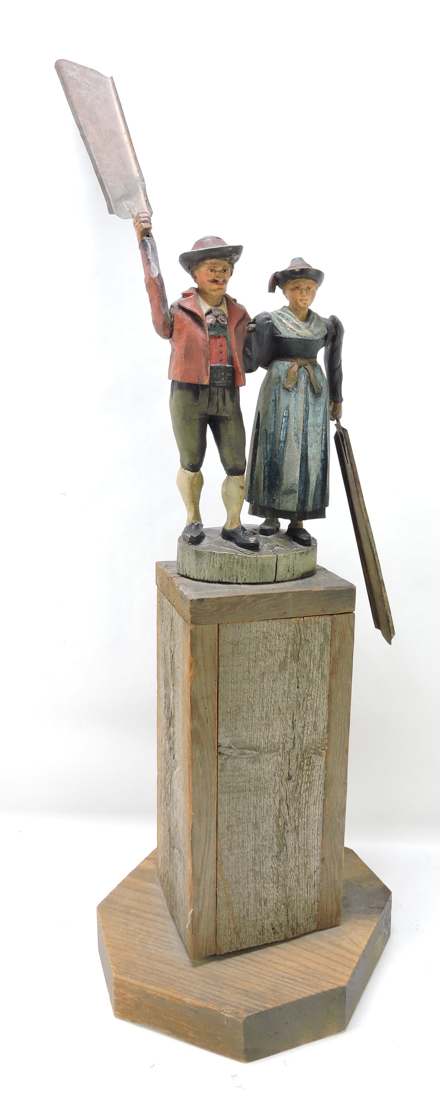 Hand carved whirligig with man and (1 of 2)