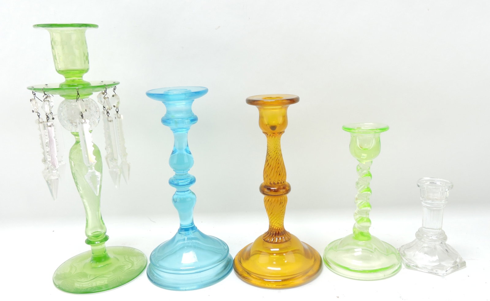 Lot of 5 glass candle sticks,: 4 1/2" to 12"