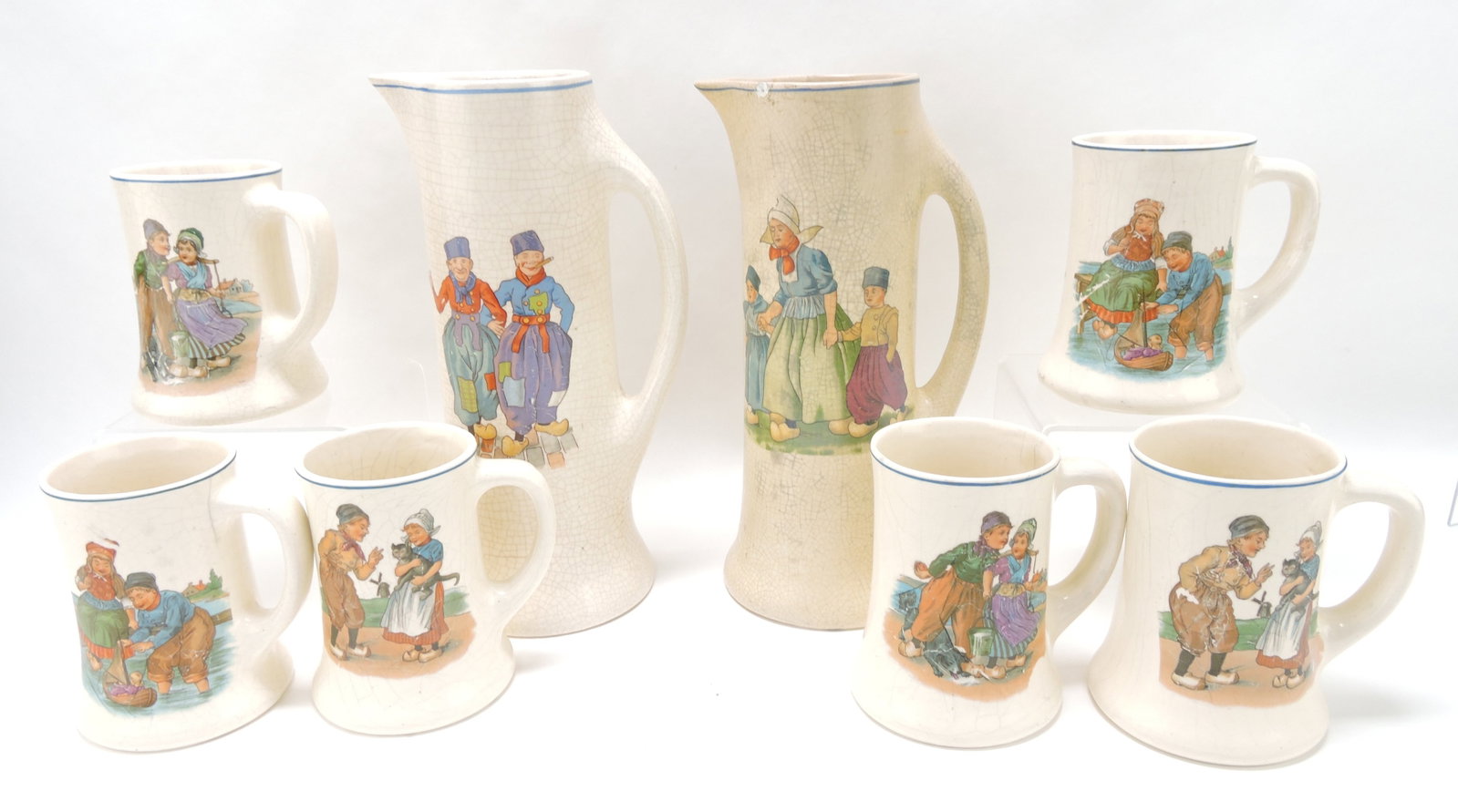Roseville 'Dutch' lot of 2 tankards 12",: and 6 - 5" mugs, various condition