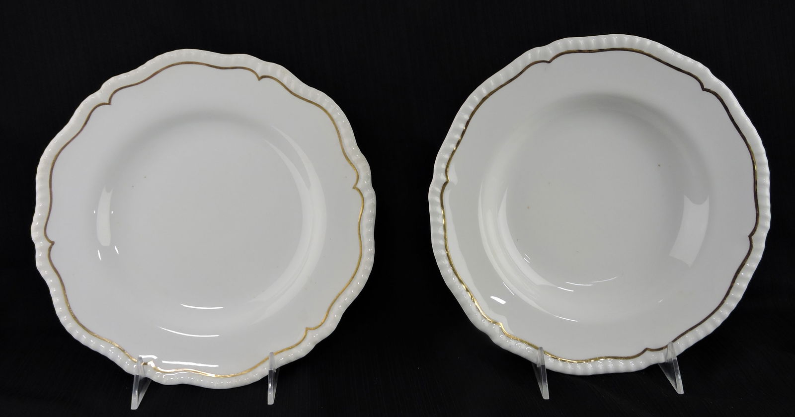 Copeland set of 10 - 10 1/4" dinner: plates and 11 - 9 3/4" soup plates with gold trim, some gold wear