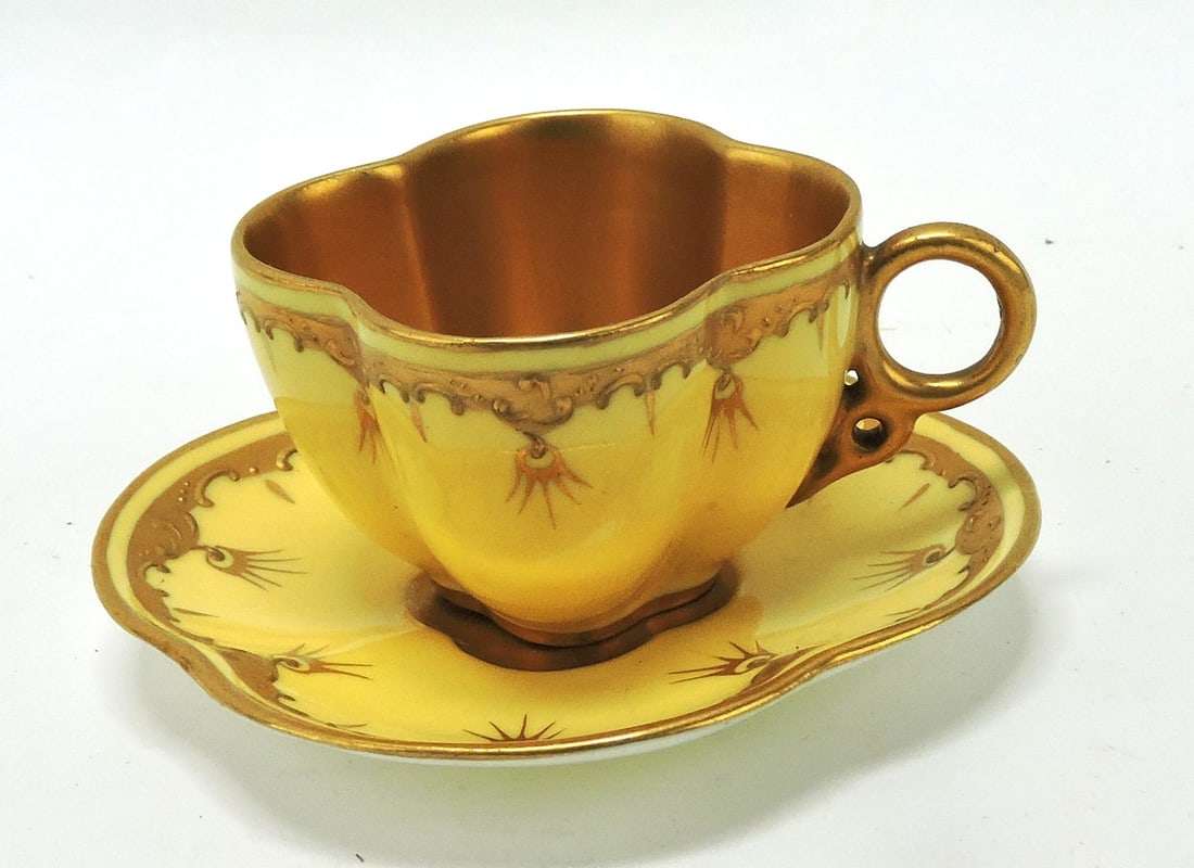 Coalport bone china clover shape: demitasse cup and saucer, yellow with gold gilting