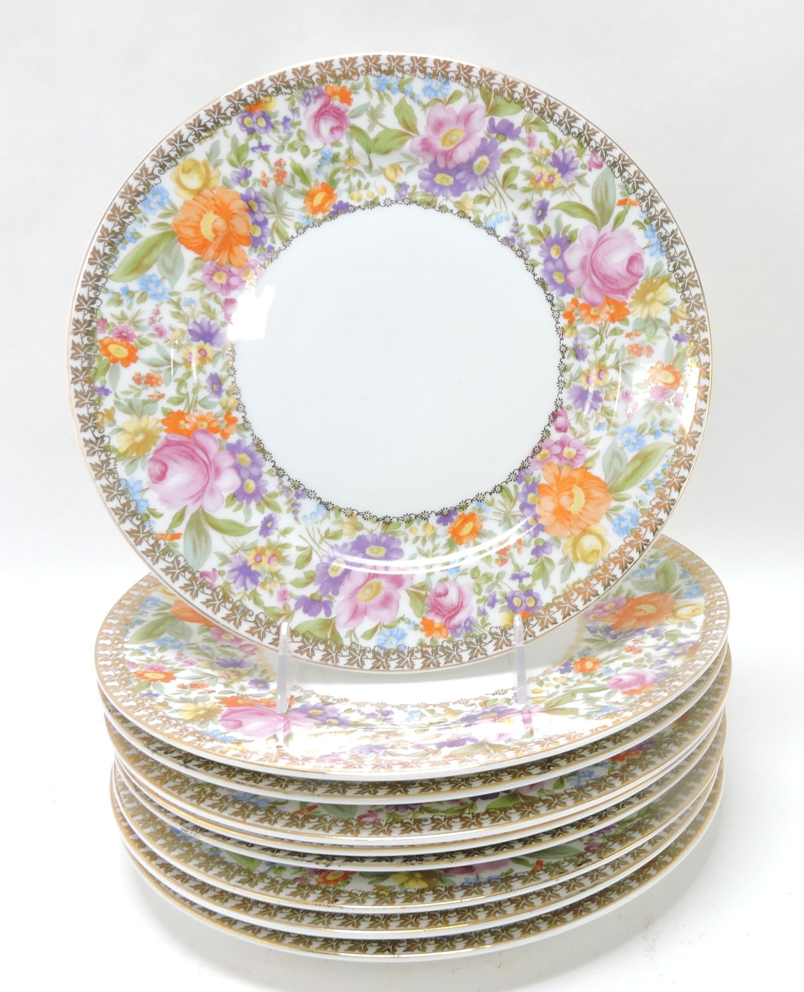 Rosenthal set of 10 - 10 3/4" porcelain: dinner plates with an elegant garden of flowers on shoulder with gold trim
