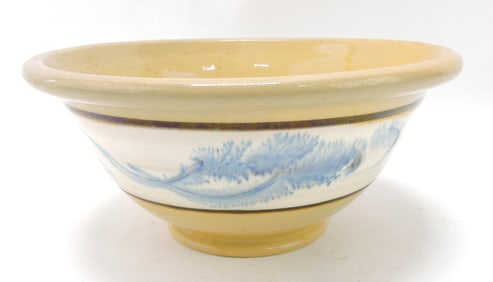 Yellow ware bowl with blue seaweed,