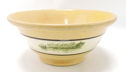 Yellow ware bowl with green seaweed,