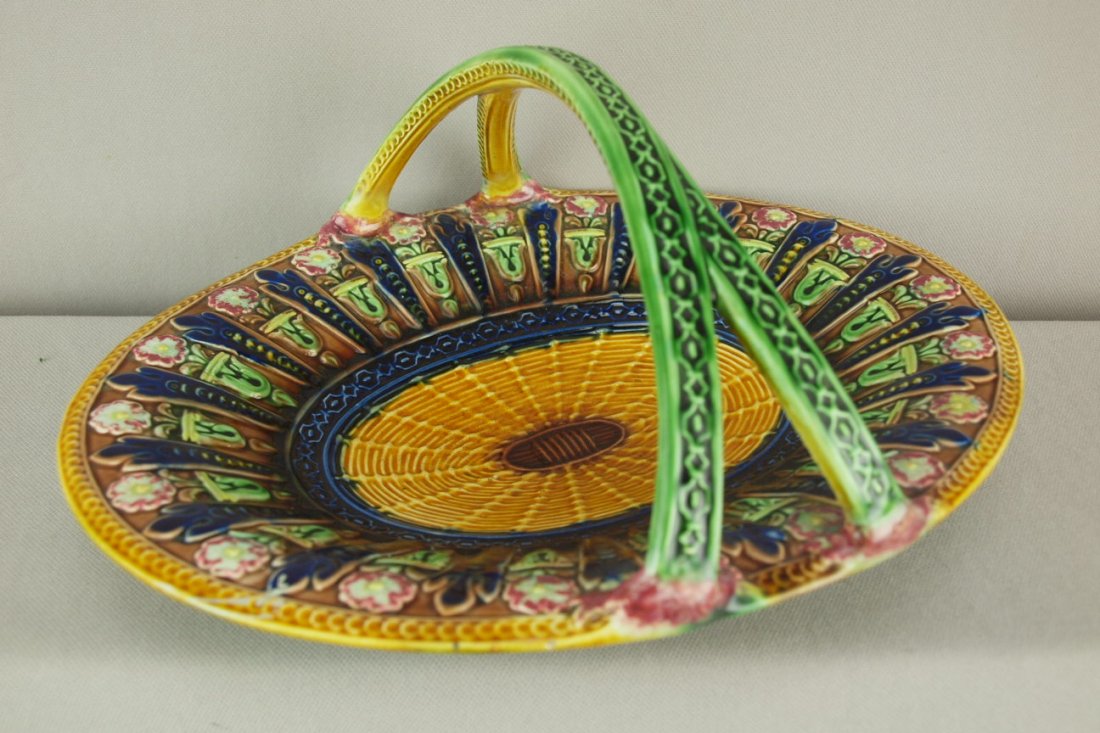 GEORGE JONES majolica oval basket with floral motif,: GEORGE JONES majolica oval basket with floral motif, professional repair to handle, rare form, 11 1/2"w
