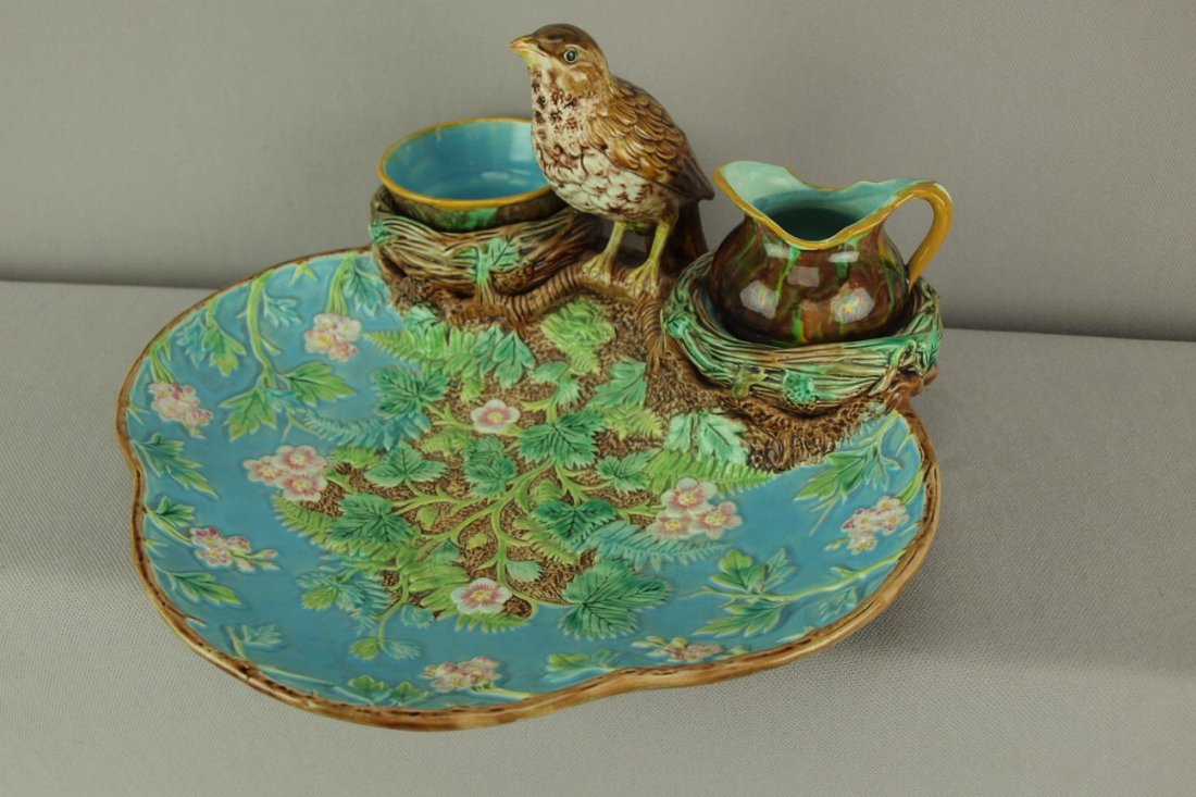 GEORGE JONES majolica strawberry server with thrush : GEORGE JONES majolica strawberry server with thrush bird handle, includes fitted mottled cream and sugar, bird professionally re-attached, hairline to sugar