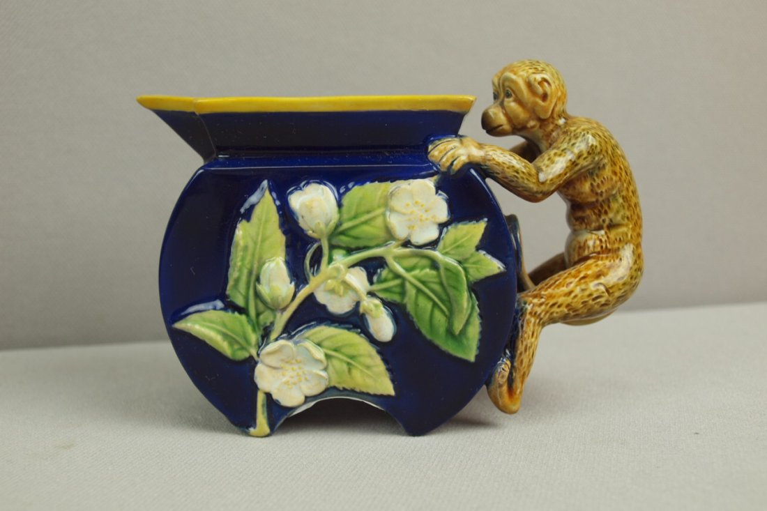 GEORGE JONES majolica cobalt floral monkey handled c: GEORGE JONES majolica cobalt floral monkey handled creamer, 3 1/4", professional rim repair