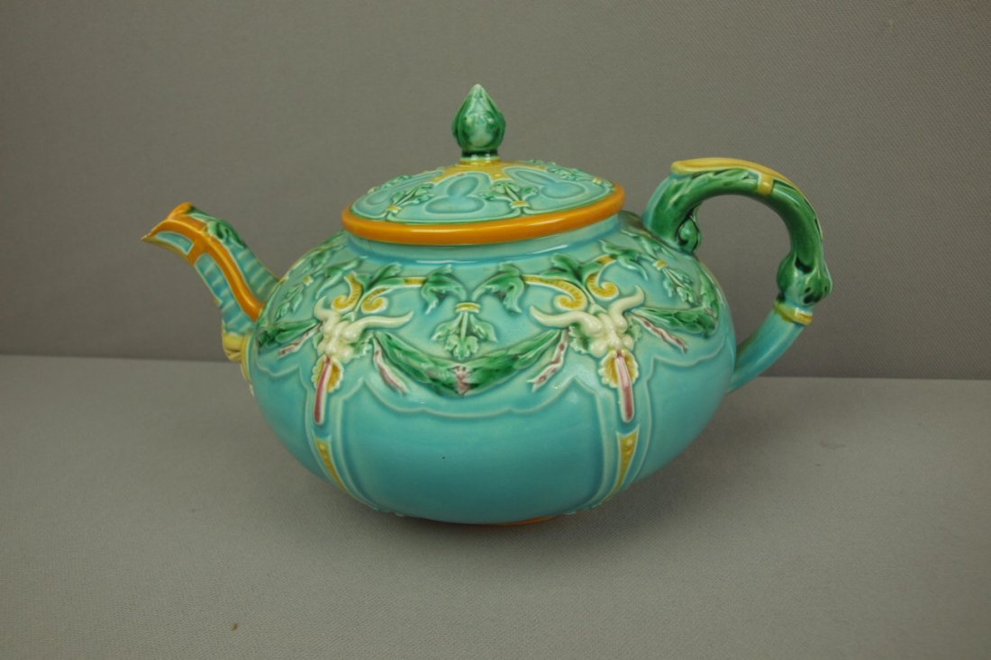 WEDGWOOD majolica rare teapot with mask at spout, ra: WEDGWOOD majolica rare teapot with mask at spout, rare form, nicks to spout, minor hairline , 5 1/2"h