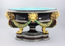 SARREGUEMINES rare majolica table center modeled wit: SARREGUEMINES rare majolica table center modeled with lions on paws holding garlands of leaves, shape no. 1045, 18 1/2", great color and detail