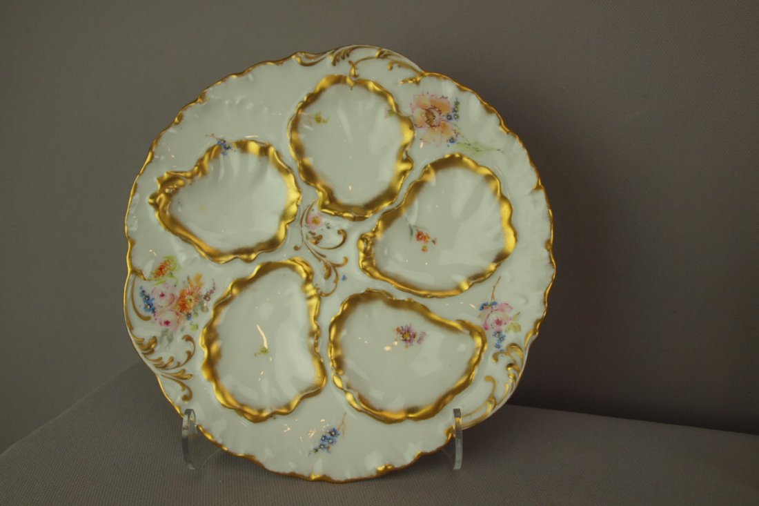 Pairpoint Limoges porcelain 5 well oyster plate with: Pairpoint Limoges porcelain 5 well oyster plate with floral and gold motif, 8"