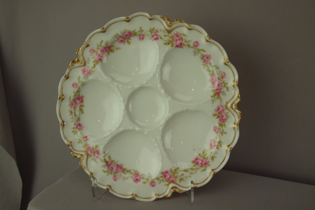 Haviland porcelain oyster plate with 5 wells and flo: Haviland porcelain oyster plate with 5 wells and floral border, 9"