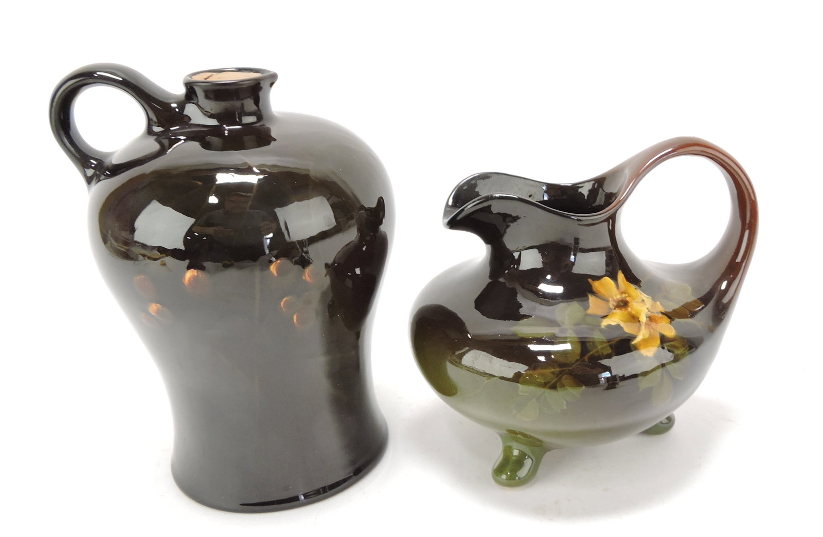 Standard glaze lot of 2 pieces,: 7" jug and 5 1/2" footed ewer