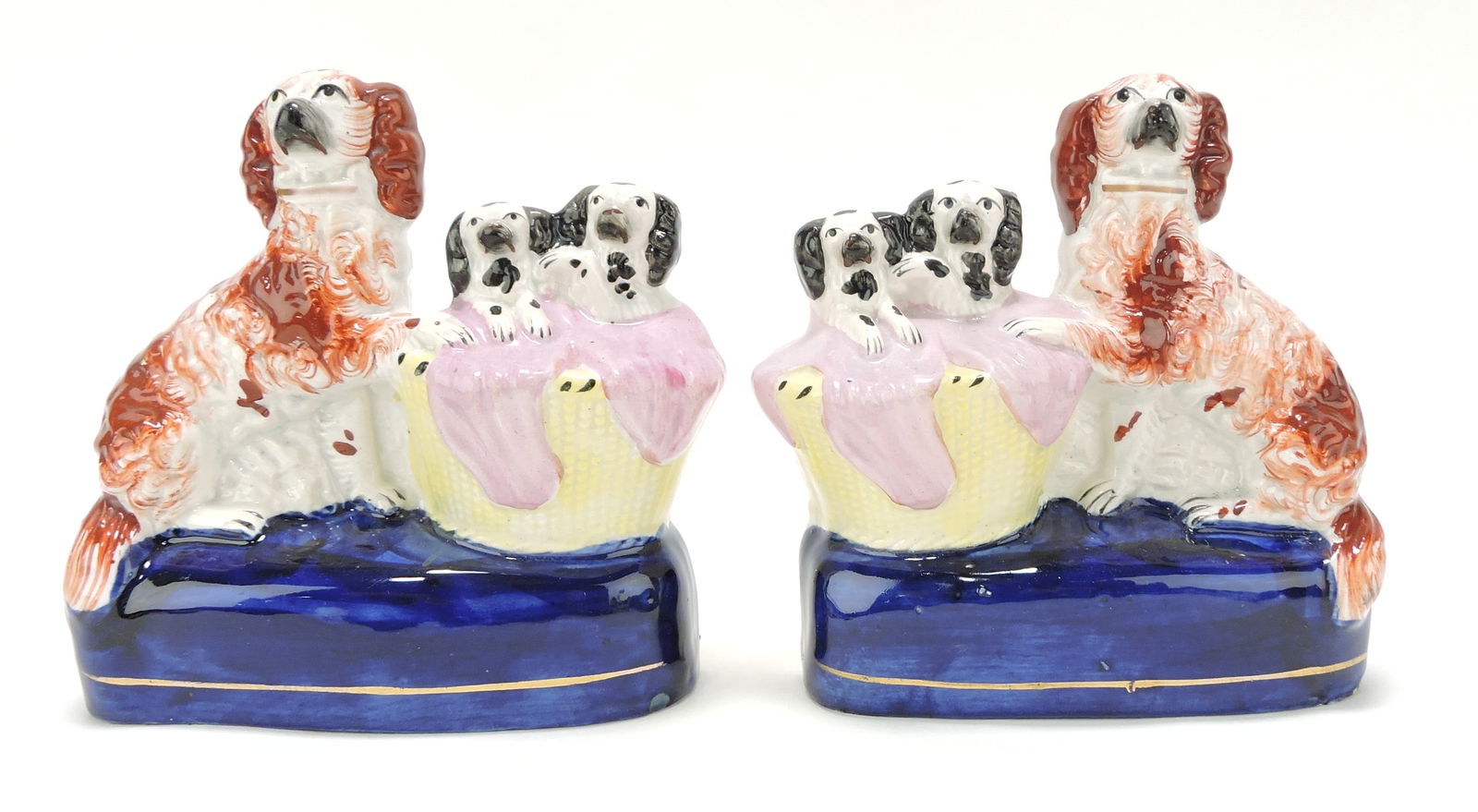 Staffordshire pair of spaniels with pups in