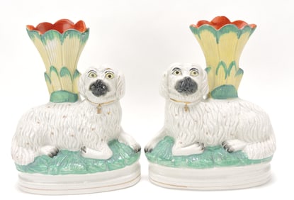 Staffordshire pair of dog spill vases,