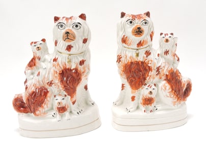 Staffordshire pair of dogs with pups,