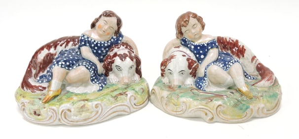 Staffordshire pair of recumbent dogs with