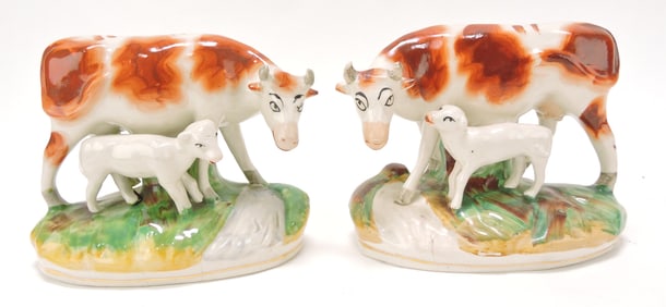 Staffordshire pair of figures of cow with