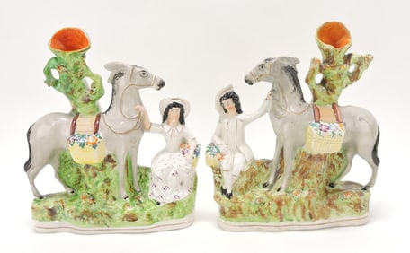 Staffordshire pair of spill vases of donkey