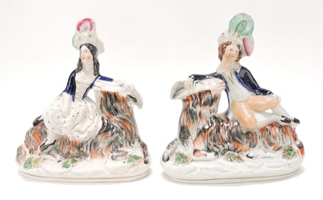 Staffordshire pair of figures with recumbent