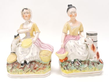 Staffordshire pair of lady figures, one with
