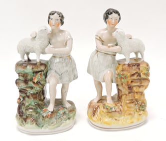 Staffordshire pair of figures of boy and