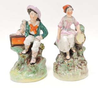 Staffordshire pair of figures of boy