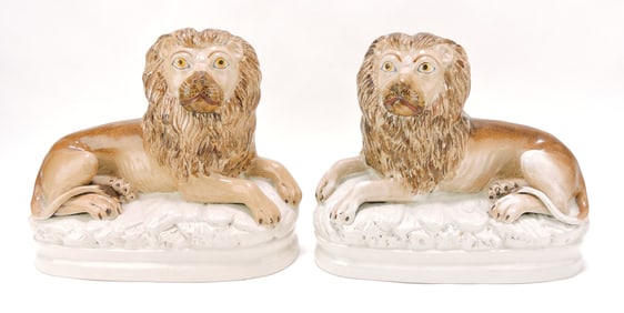 Staffordshire pair of recumbent lions, 9"h