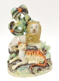 Staffordshire figure of a lion and tiger,